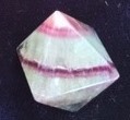 Polished banded pink and green crystal